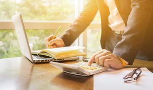 Pension risk transfer concept with benefits document on table