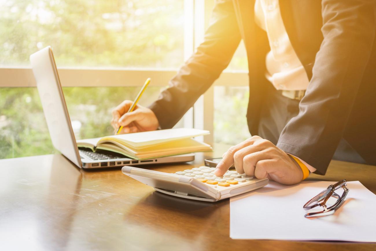 Pension risk transfer concept with benefits document on table